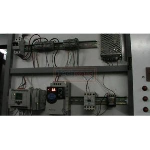 Integrated Automation and Control of Industrial Boiler: A PLC-Driven Temperature and Motor Speed Control System with AC Drive